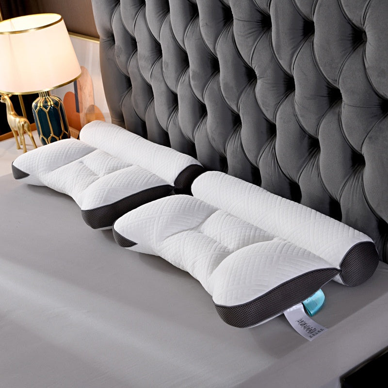 Neck Pillow featuring ergonomic contour and goose down fill for neck and shoulder pain relief.