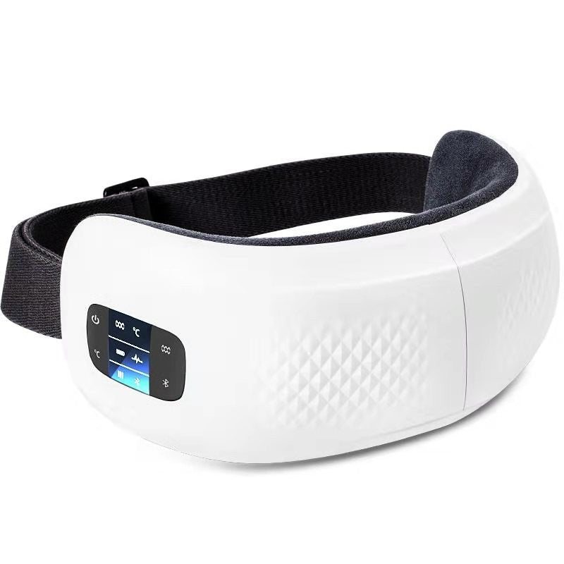 A white eye massager device with a black strap and control panel, designed for relieving eye strain and providing a soothing experience.
