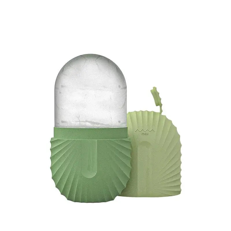 Green silicone ice face roller, reusable skincare tool to soothe skin, lift contours and reduce puffiness naturally.