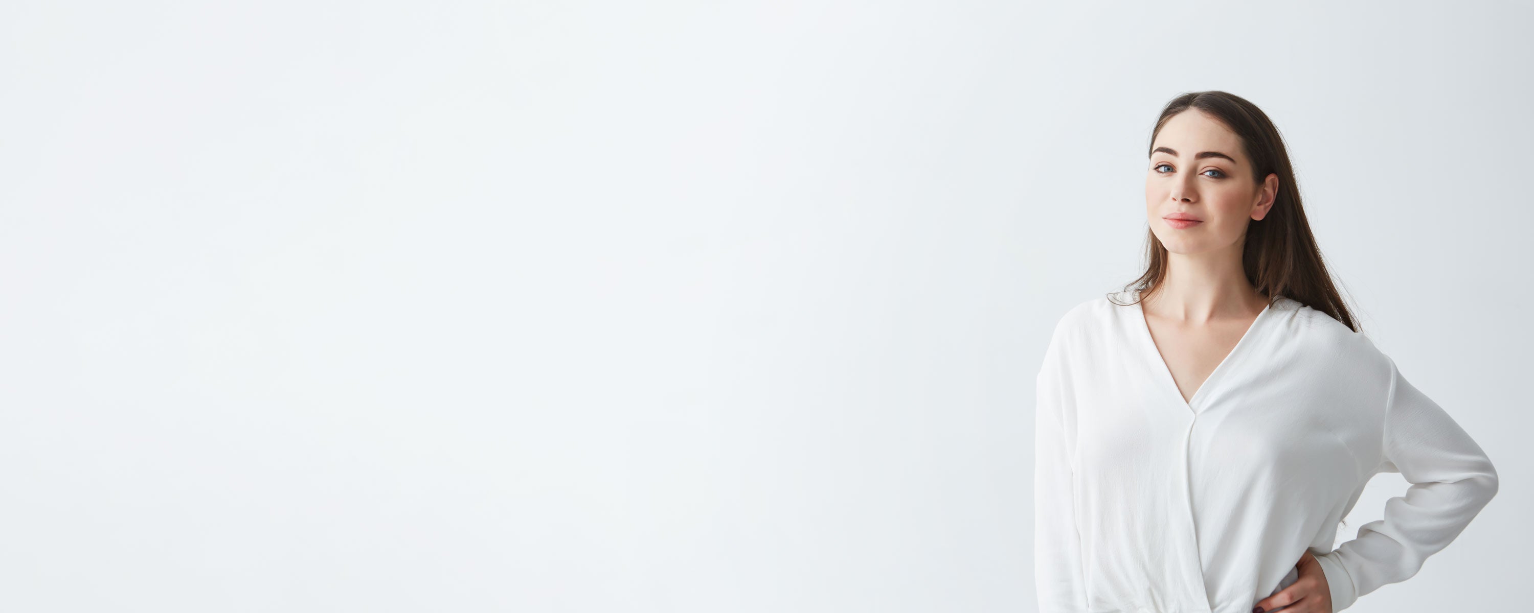 Confident woman smiling with folded arms, representing BeautyEssence Help Centre